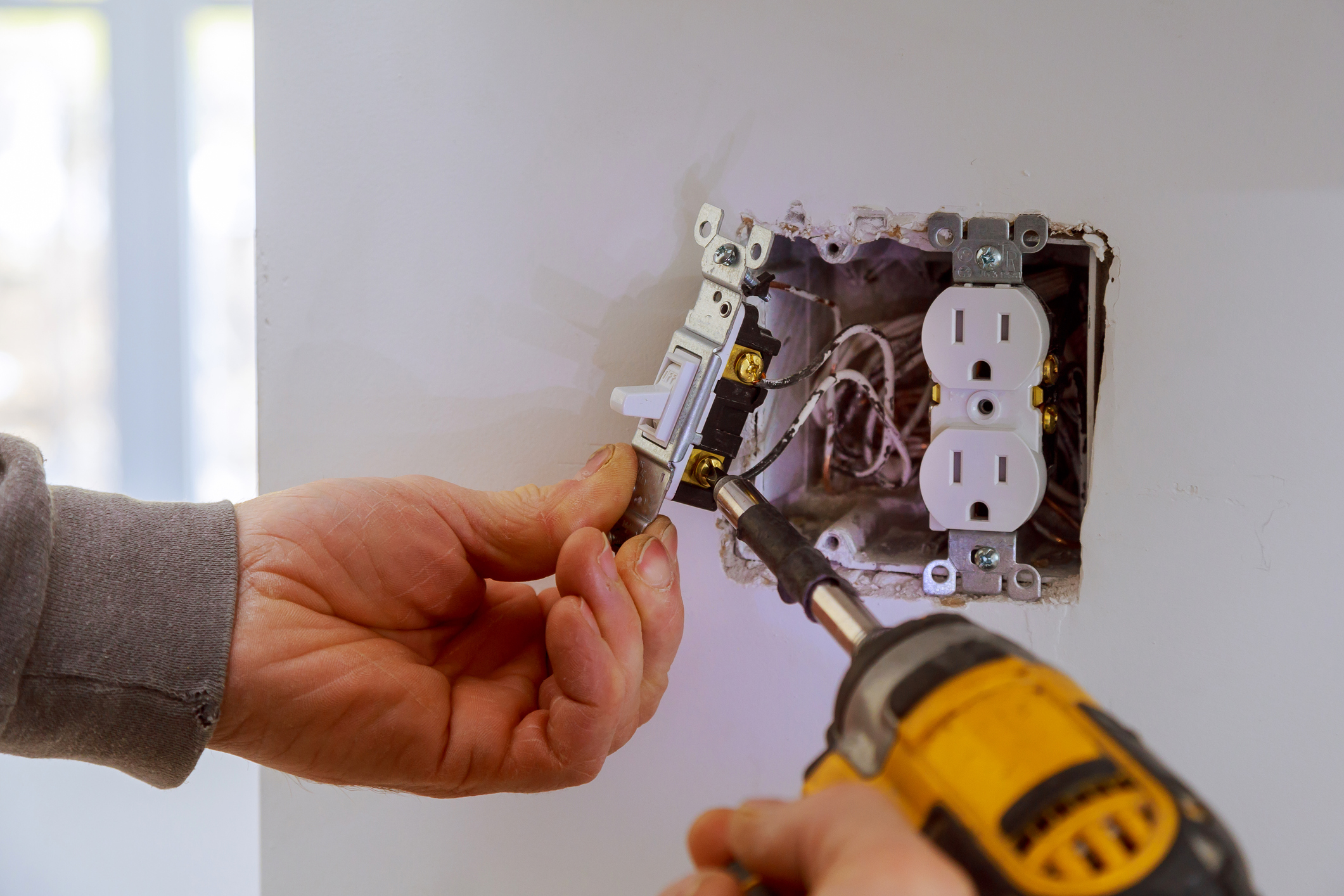 electrician repair a power switch